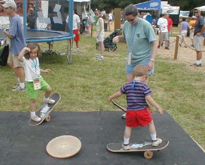 06_SydneyTammyAvynBalancingOnSkateBoardsCampJeep2003