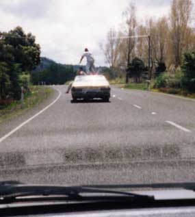 KiwiGuySurfingCar_web.jpg (15625 bytes)