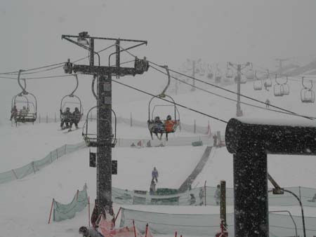 SkiTrip2004AR_SydneyAndAlecLopataOnChairlift