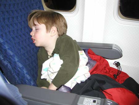 SkiTrip2004CH_AvynNappingOnFlightHome