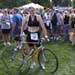 NapervilleTriathlon2004L_TamWithBikeAtFinish